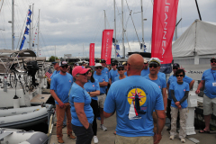 event attendees wearing their matching rendezvous tshirts posing in group