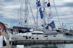 boats with jeanneau flags at rendezvous 