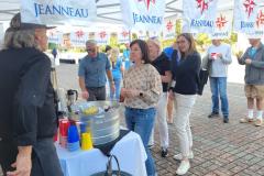 event attendees getting drinks outside 